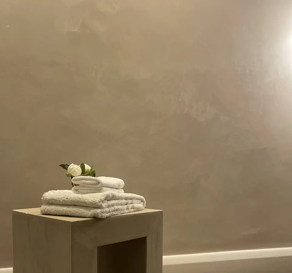 Hampstead interior with warm Venetian plaster carried through connected living spaces